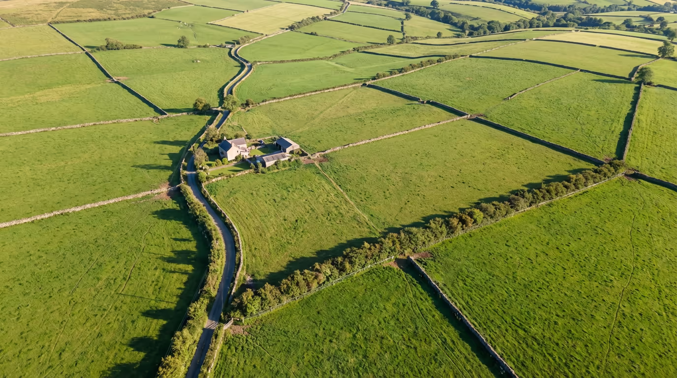 Drone view of UK countryside showing property boundaries and hedgerows