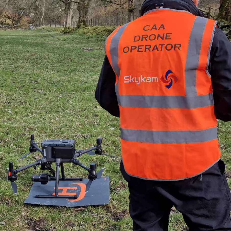 Professional drone pilot with gas detection reporting equipment UK