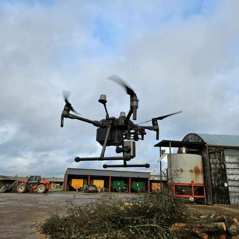 Drone equipped with LiDAR sensor scanning terrain
