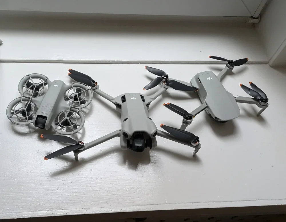 DJI Neo 2 hovering in clear conditions well away from any body of water