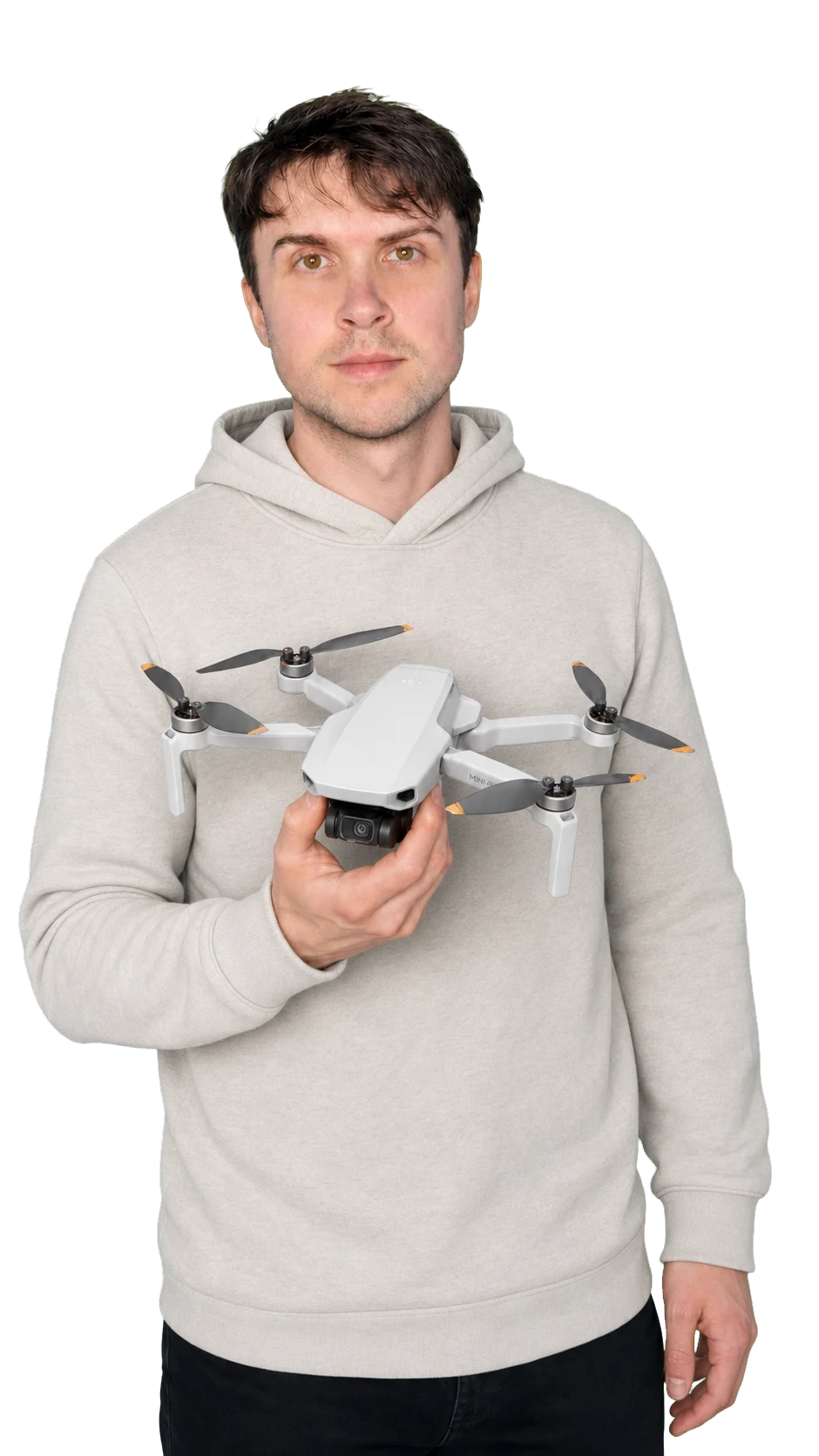 Peter Leslie holding the DJI Mini 4K