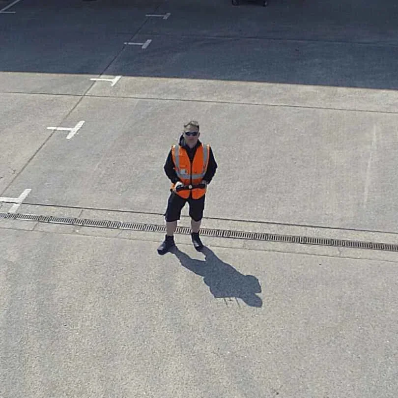 Sub-250g drone photographed from above showing scale