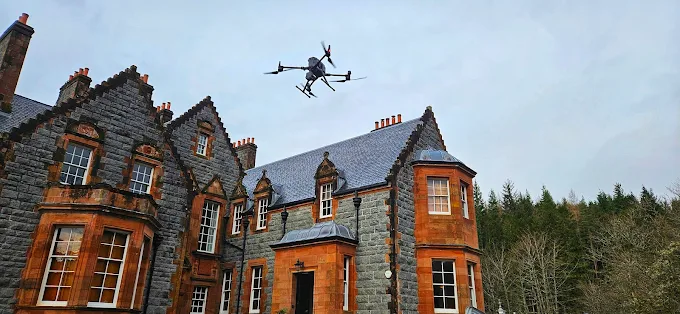 Close-up drone capture of roof flashing and lead detail