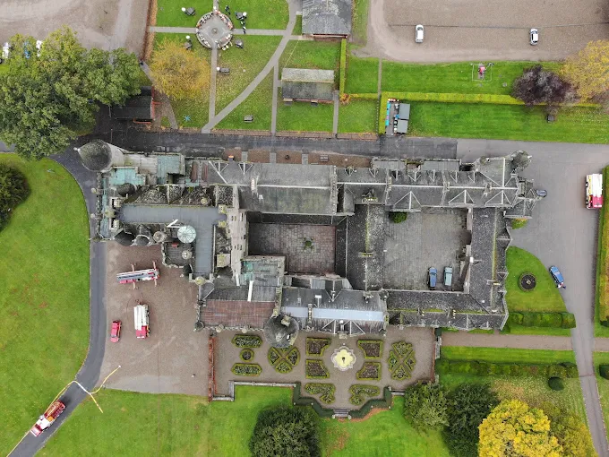 Overhead drone view of chimney stack and surrounding tiles